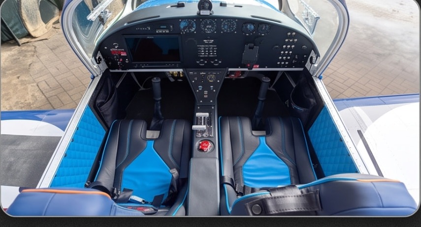 Sky blue quilted leather interior with modern avionics panel