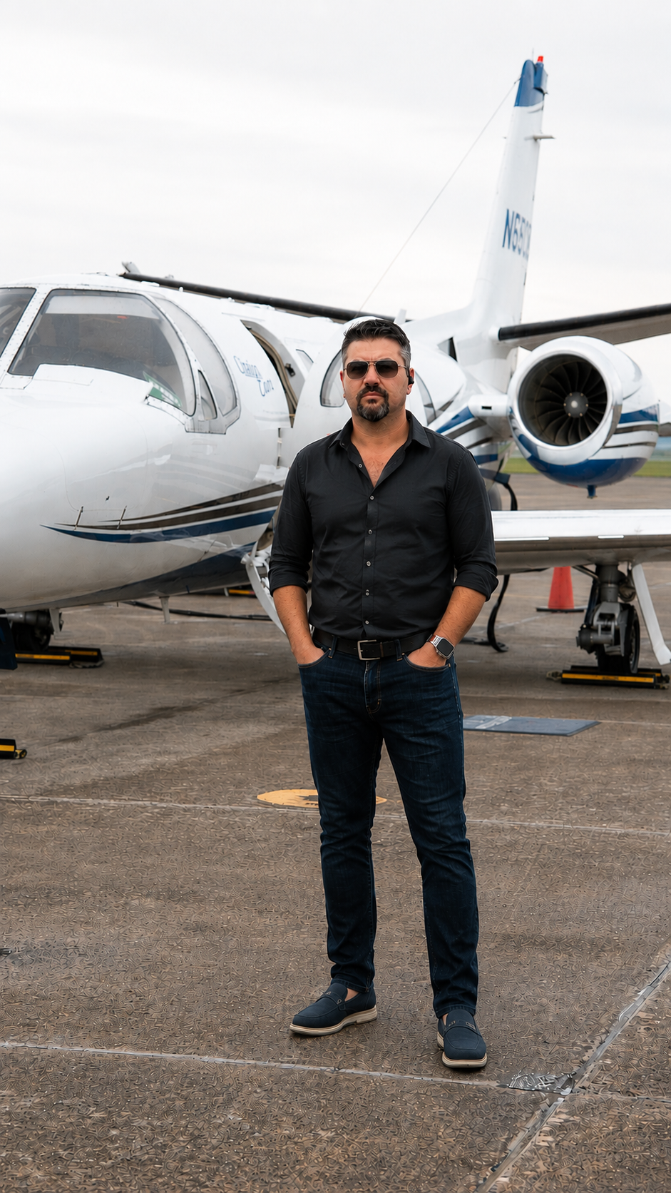 Vladimir Shteyn, exclusive U.S. partner for Belmont Aero, standing on the ramp in front of a business jet